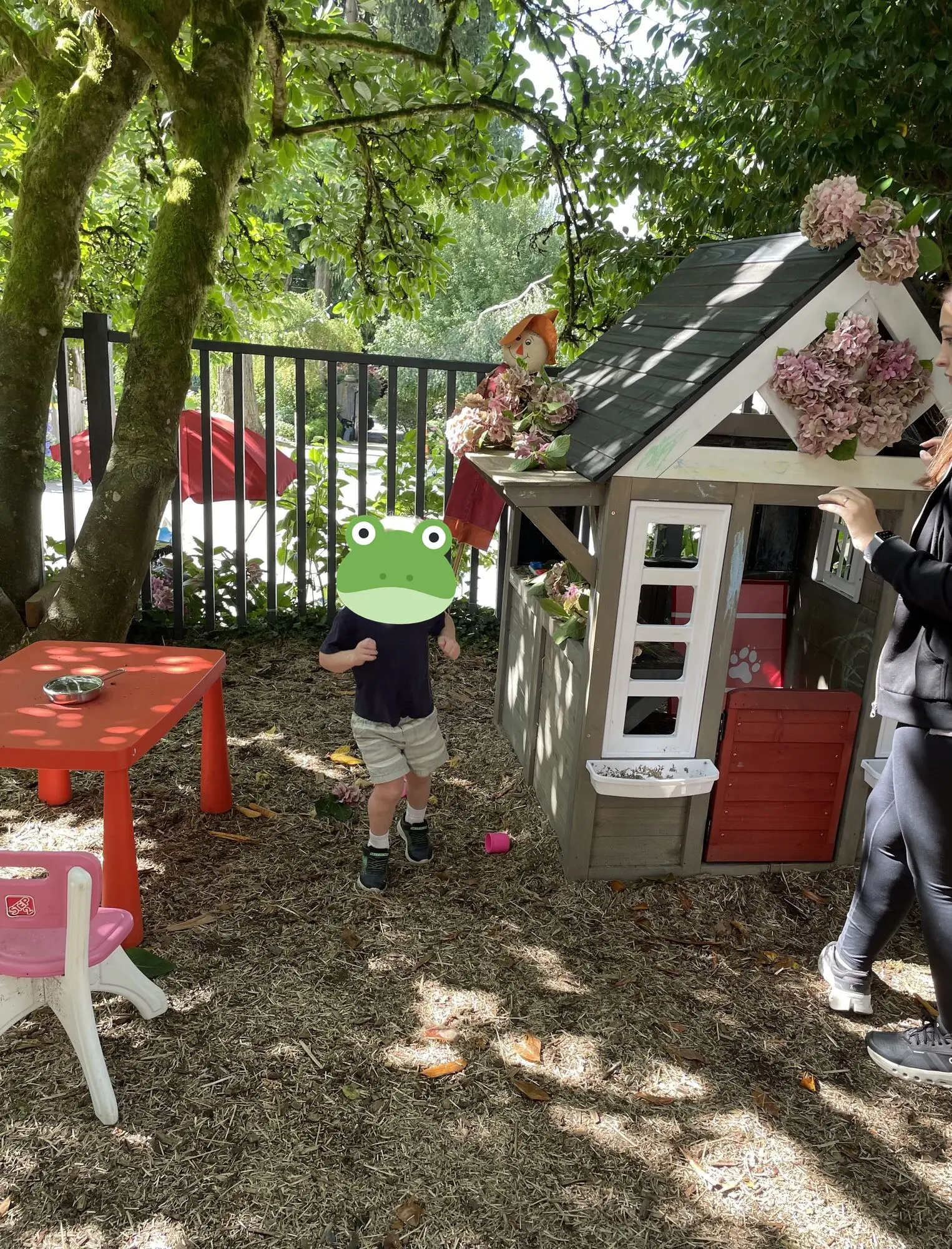 The playhouse in the yard